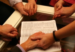 praying-hands-over-bible-small41.jpg